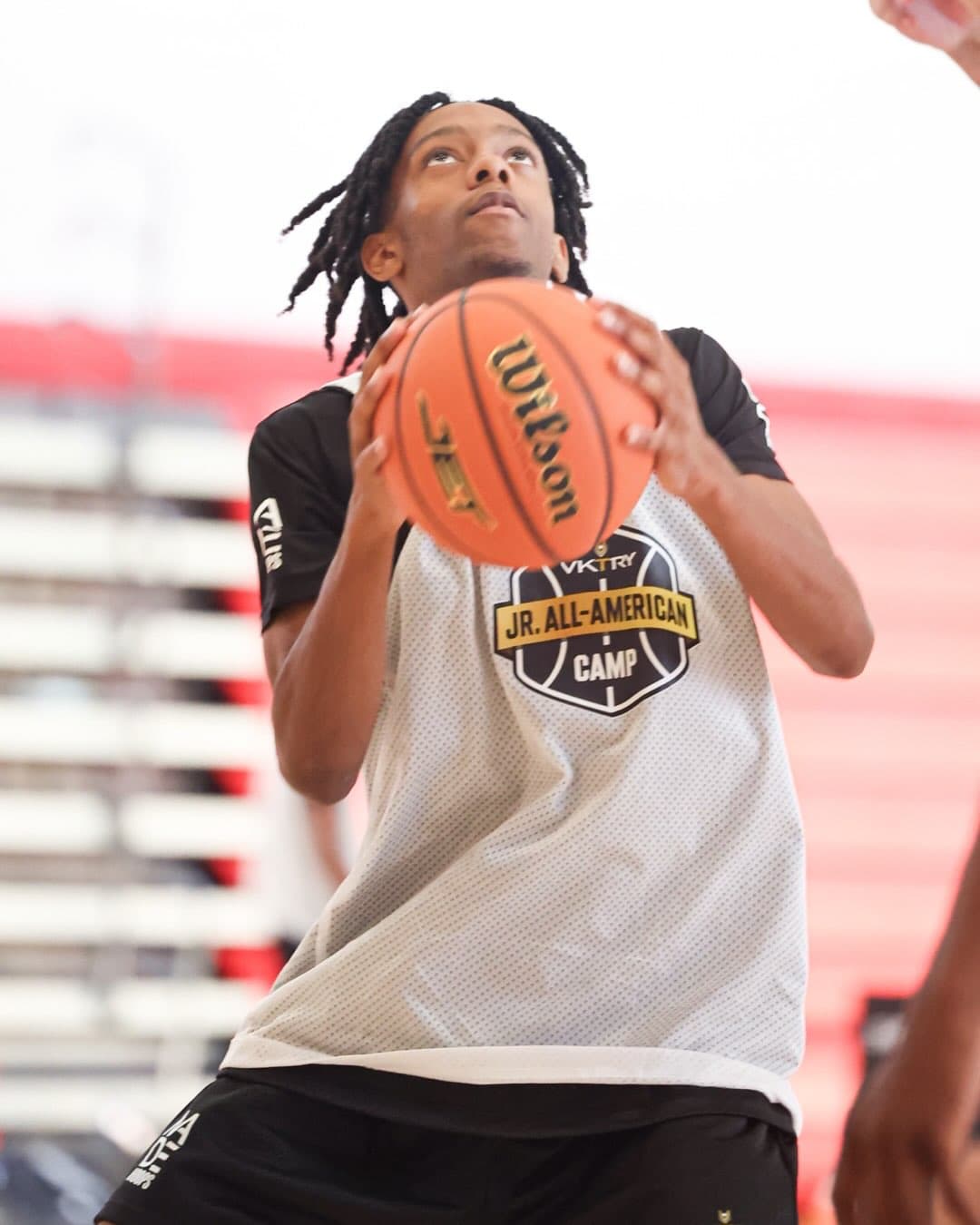 Jacob Mariner gathering the ball and looking toward the basket at the VKTRY Jr. All-American Camp