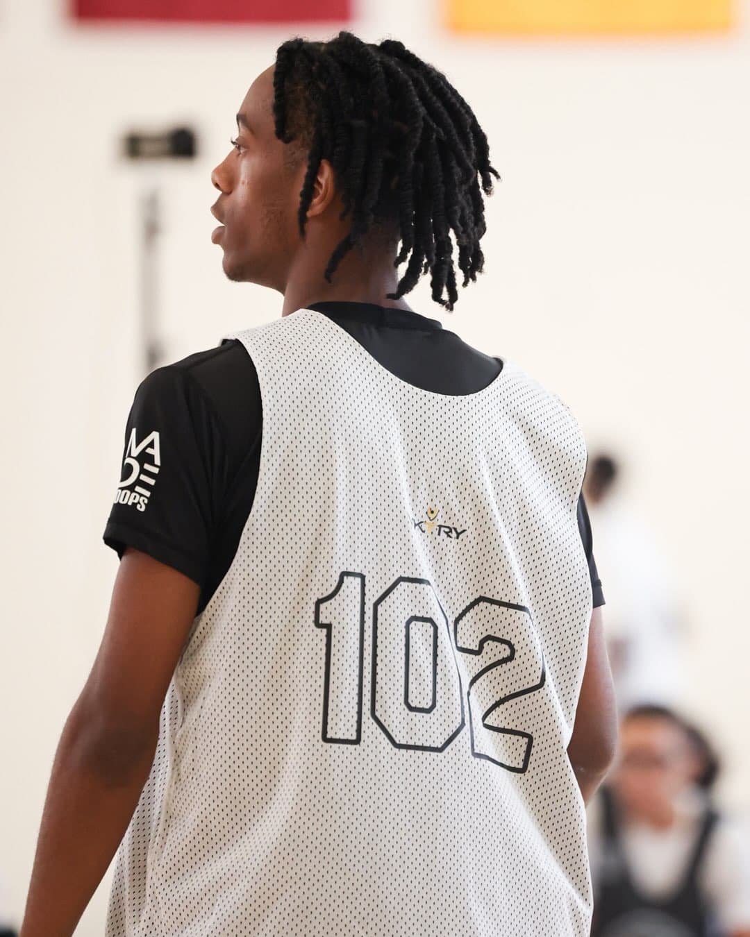 Jacob Mariner wearing number 102 at the VKTRY Jr. All-American Camp
